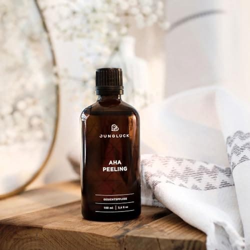 JUNGLÜCK AHA Peeling Gesicht Vegan - Nachtregen für glatte und feuchtige Haut
| JUNGLÜCK AHA Peeling Gesicht - Mildes F