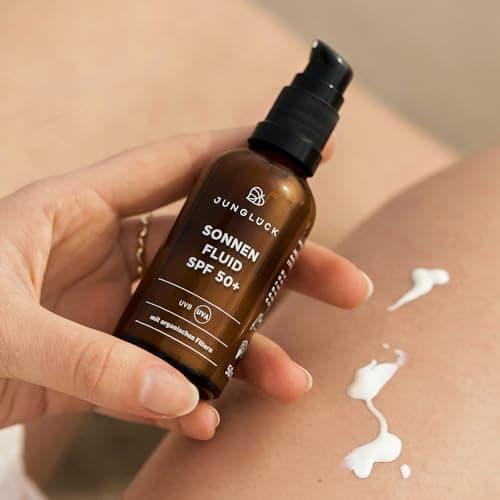 JUNGLÜCK Sonnenfluid Gesicht SPF 50+ - Vegan | Leichte Gesichtslotion ohne Weißeleffekt | Breitspektrum UV-Schutz LSF 50